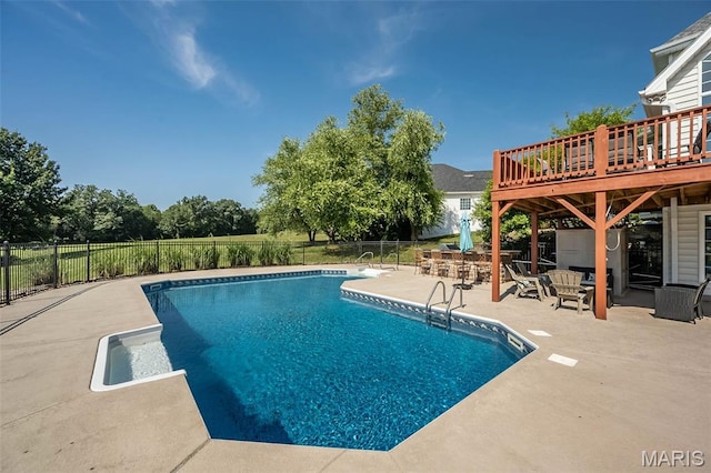 2314 Longest Dr, Wentzville, MO 63385 - view of swimming pool with a patio area and a wooden deck