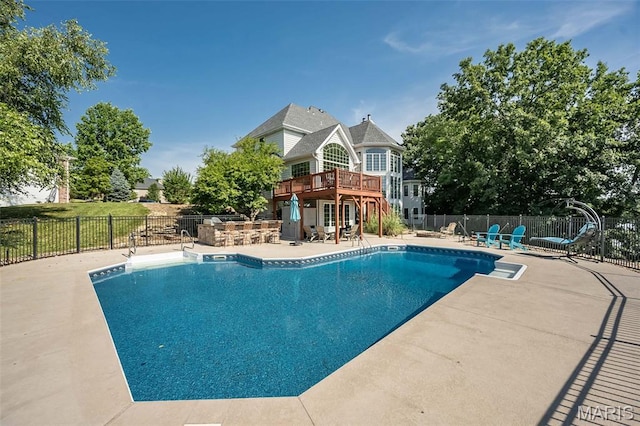 2314 Longest Dr, Wentzville, MO 63385 - view of pool featuring a patio and a wooden deck