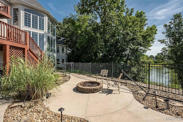 2314 Longest Dr, Wentzville, MO 63385 - view of patio / terrace featuring a fire pit and stairs