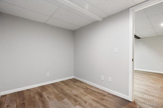 434 Cool Springs Ln, Wright City, MO 63390 - empty room with a drop ceiling and wood finished floors