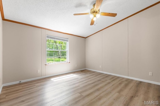 434 Cool Springs Ln, Wright City, MO 63390 - unfurnished room with ornamental molding, vaulted ceiling, light wood-style floors, a textured ceiling, and ceiling fan
