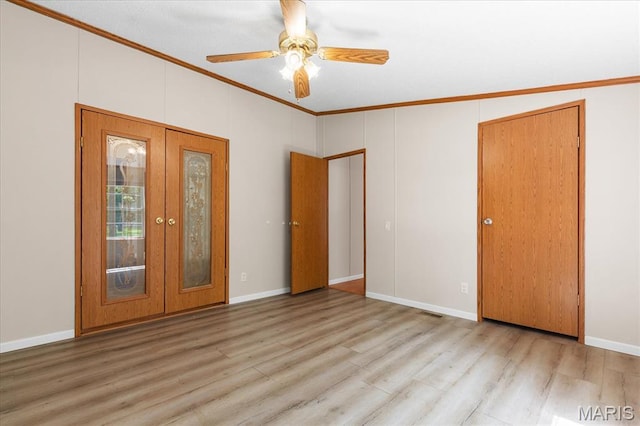 434 Cool Springs Ln, Wright City, MO 63390 - spare room featuring ornamental molding, wood finished floors, french doors, and a ceiling fan