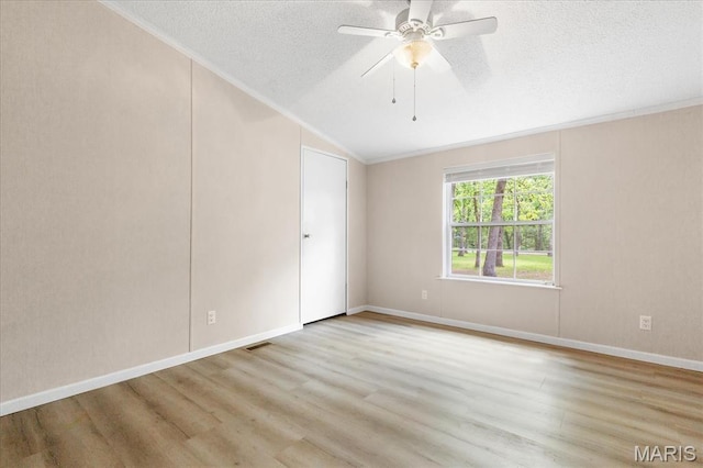 434 Cool Springs Ln, Wright City, MO 63390 - unfurnished room with lofted ceiling, crown molding, wood finished floors, a textured ceiling, and ceiling fan
