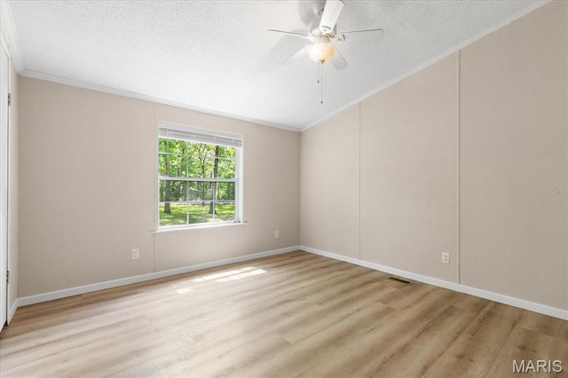 434 Cool Springs Ln, Wright City, MO 63390 - unfurnished room featuring crown molding, a textured ceiling, light wood-style flooring, and a ceiling fan