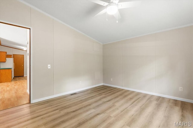 434 Cool Springs Ln, Wright City, MO 63390 - empty room featuring vaulted ceiling, light wood-style flooring, a ceiling fan, and crown molding