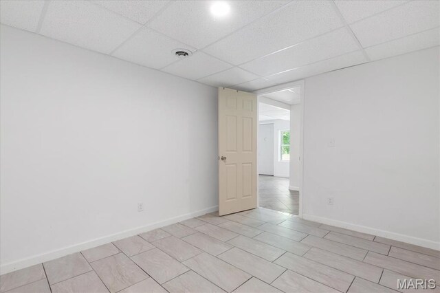 434 Cool Springs Ln, Wright City, MO 63390 - unfurnished room with a drop ceiling and baseboards