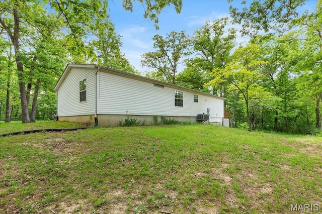 434 Cool Springs Ln, Wright City, MO 63390 - view of home's exterior featuring a lawn and a central air condition unit
