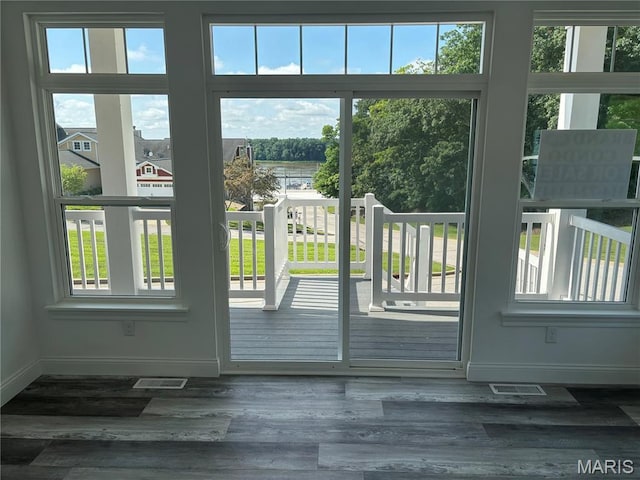 314 Captains Ct, Grafton, IL 62037 - doorway to outside with wood finished floors and a water view