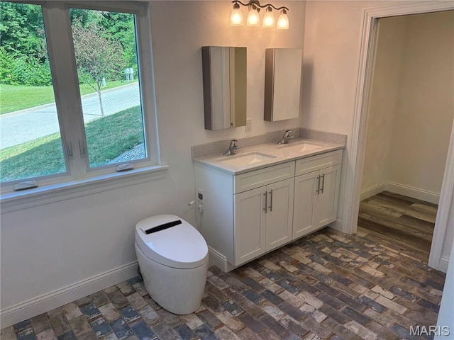 314 Captains Ct, Grafton, IL 62037 - bathroom with double vanity and brick floors