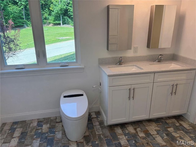 314 Captains Ct, Grafton, IL 62037 - full bath featuring double vanity and baseboards