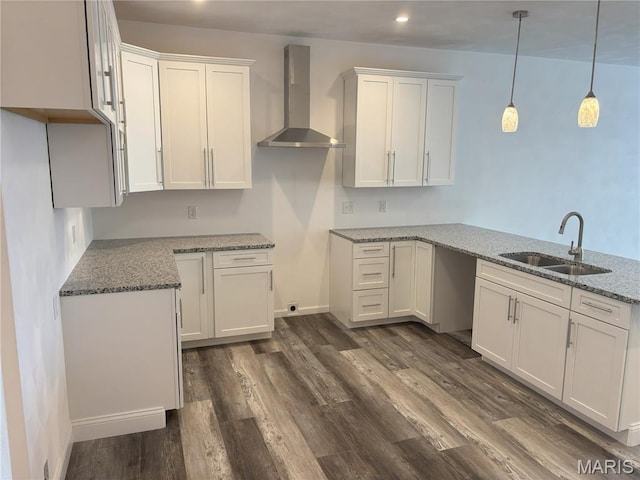 314 Captains Ct, Grafton, IL 62037 - kitchen featuring wall chimney exhaust hood, light stone countertops, white cabinets, dark wood-type flooring, and recessed lighting