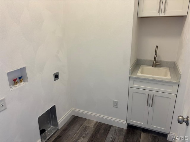 314 Captains Ct, Grafton, IL 62037 - laundry room featuring hookup for an electric dryer, dark wood finished floors, washer hookup, and cabinet space