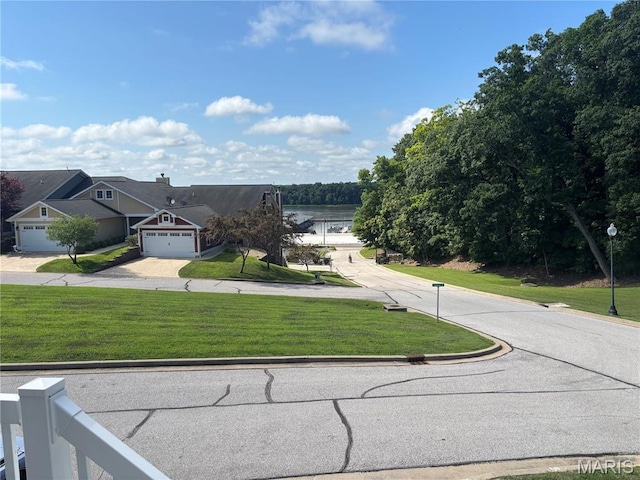 314 Captains Ct, Grafton, IL 62037 - view of asphalt road with curbs and a water view
