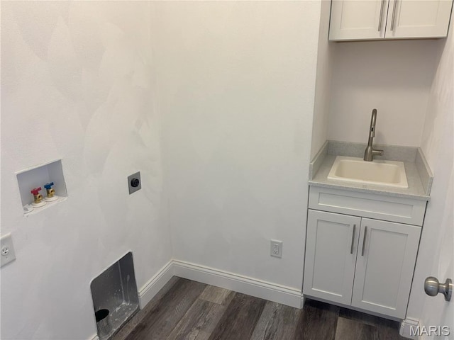 314 Captains Ct, Grafton, IL 62037 - laundry area with hookup for an electric dryer, hookup for a washing machine, dark wood finished floors, and cabinet space