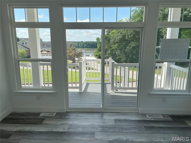 314 Captains Ct, Grafton, IL 62037 - doorway to outside featuring wood finished floors and a water view