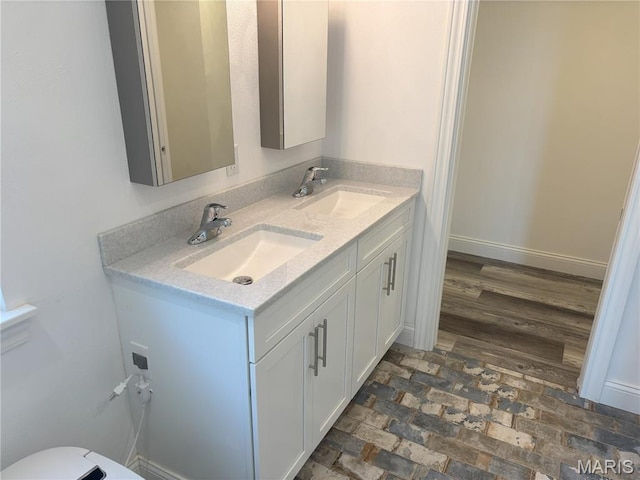 314 Captains Ct, Grafton, IL 62037 - bathroom featuring double vanity and toilet