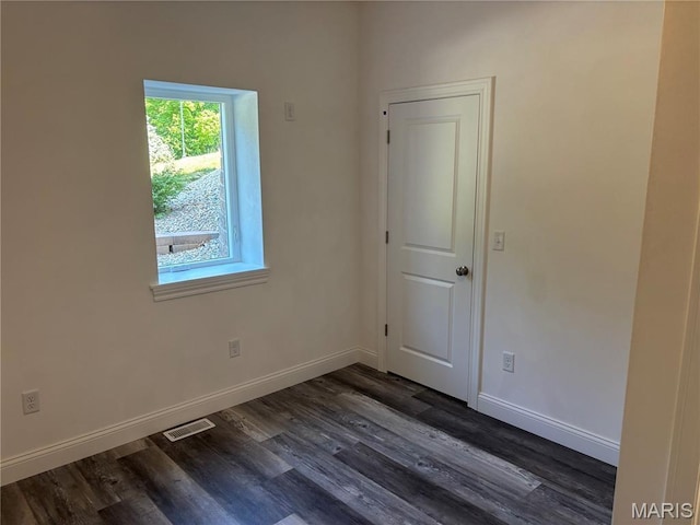 314 Captains Ct, Grafton, IL 62037 - spare room featuring dark wood finished floors and baseboards