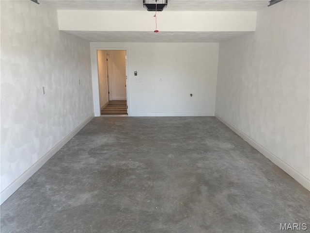 314 Captains Ct, Grafton, IL 62037 - garage featuring baseboards and a garage door opener