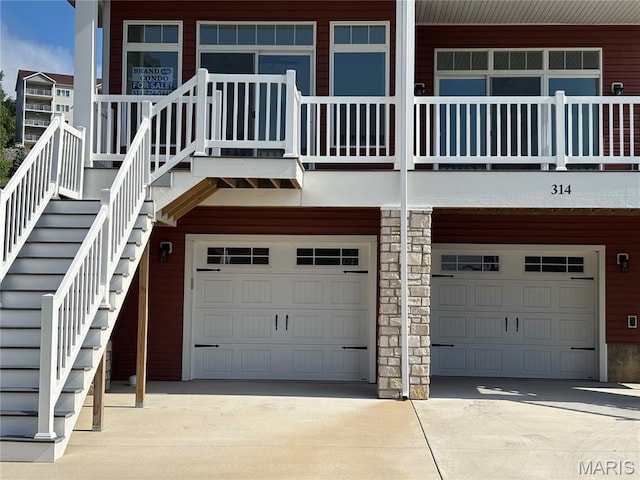 314 Captains Ct, Grafton, IL 62037 - exterior space featuring a garage and concrete driveway