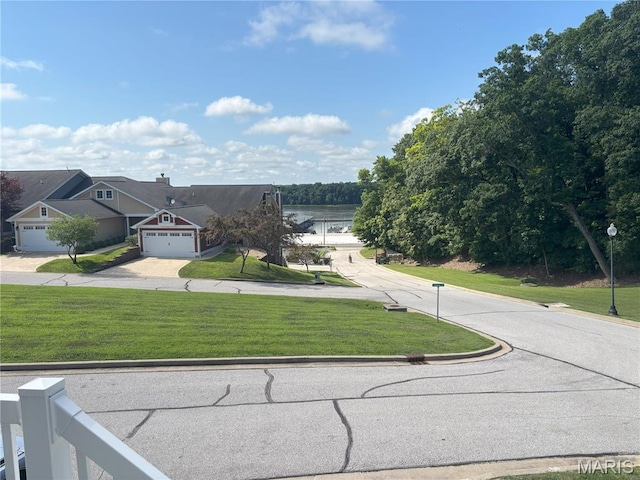 314 Captains Ct, Grafton, IL 62037 - view of asphalt road featuring curbs and a water view