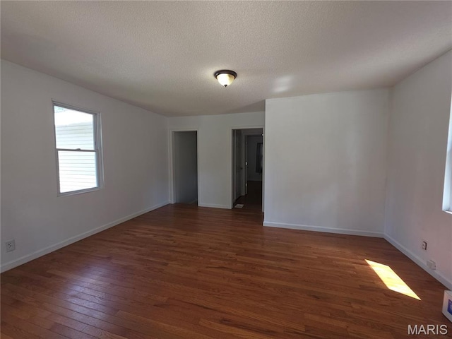 123 W Wickliffe Ave, Collinsville, IL 62234 - spare room with hardwood / wood-style floors and a textured ceiling