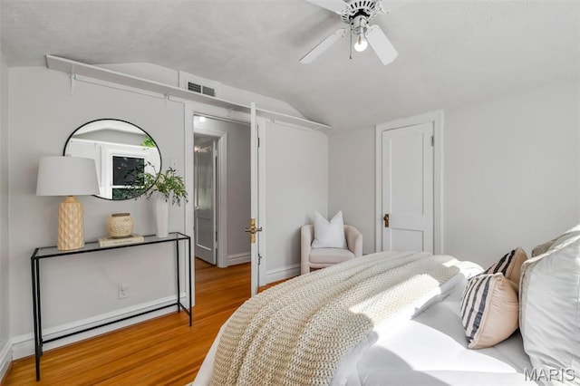 2733 Hermitage Ave, Saint Louis, MO 63143 - bedroom featuring vaulted ceiling, wood finished floors, and ceiling fan