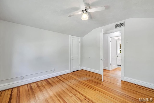 2733 Hermitage Ave, Saint Louis, MO 63143 - unfurnished room featuring lofted ceiling, light wood-type flooring, and ceiling fan