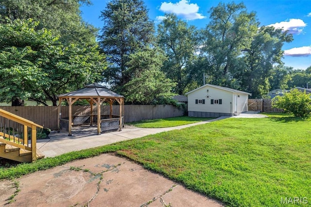 2733 Hermitage Ave, Saint Louis, MO 63143 - fenced backyard featuring a patio area and a gazebo