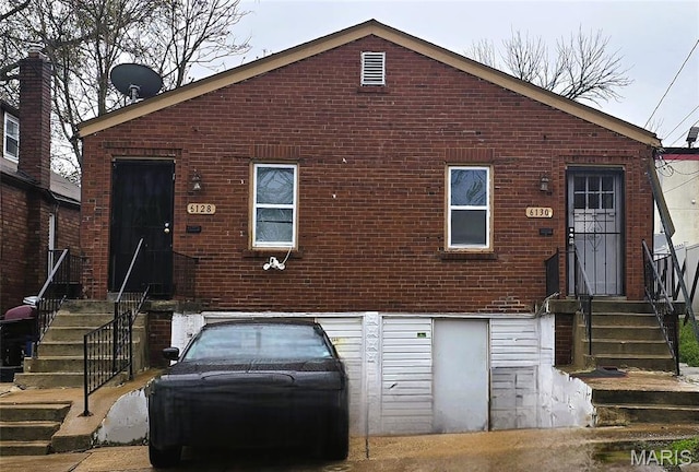 6128 Bircher St, Saint Louis, MO 63120 - back of house featuring brick siding