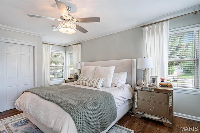 107 Huntleigh Dr, Kirkwood, MO 63122 - bedroom featuring ornamental molding, dark wood-style flooring, a ceiling fan, and a closet