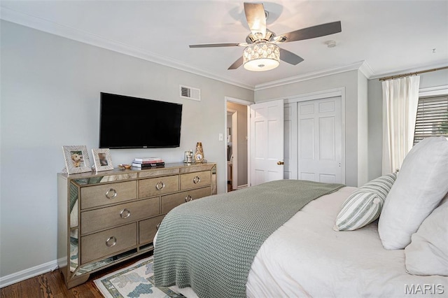 107 Huntleigh Dr, Kirkwood, MO 63122 - bedroom featuring ornamental molding, a closet, dark wood-type flooring, and ceiling fan