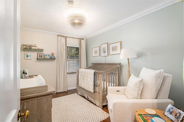 107 Huntleigh Dr, Kirkwood, MO 63122 - bedroom with crown molding and dark wood-style flooring