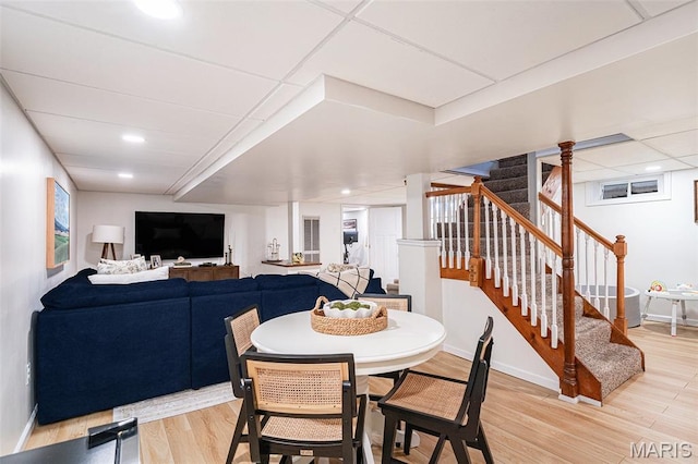 107 Huntleigh Dr, Kirkwood, MO 63122 - dining room featuring stairs, light wood-style flooring, and recessed lighting