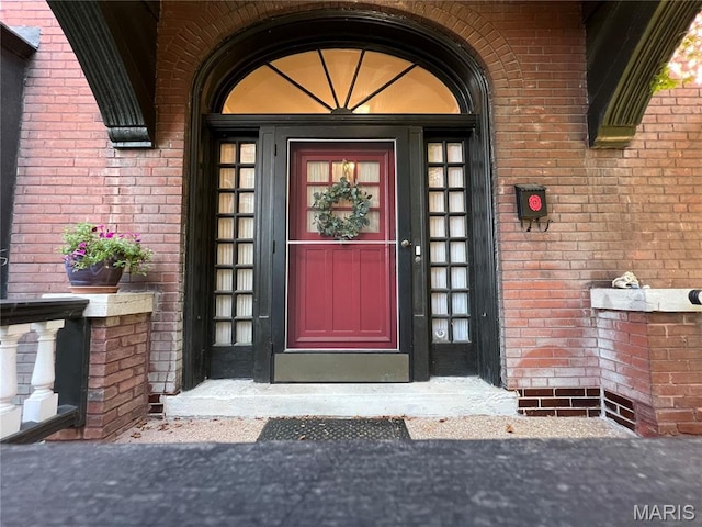 6336 Pershing Ave, University City, MO 63130 - doorway to property featuring brick siding