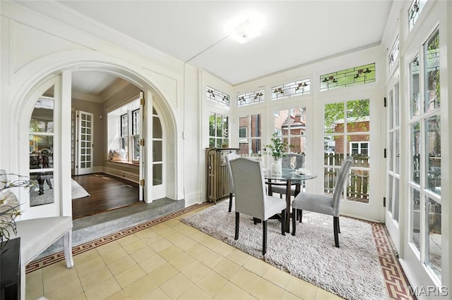 6336 Pershing Ave, University City, MO 63130 - sunroom / solarium featuring french doors and arched walkways