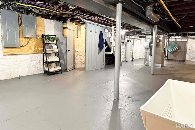 6336 Pershing Ave, University City, MO 63130 - unfinished below grade area featuring electric panel, water heater, and heating unit