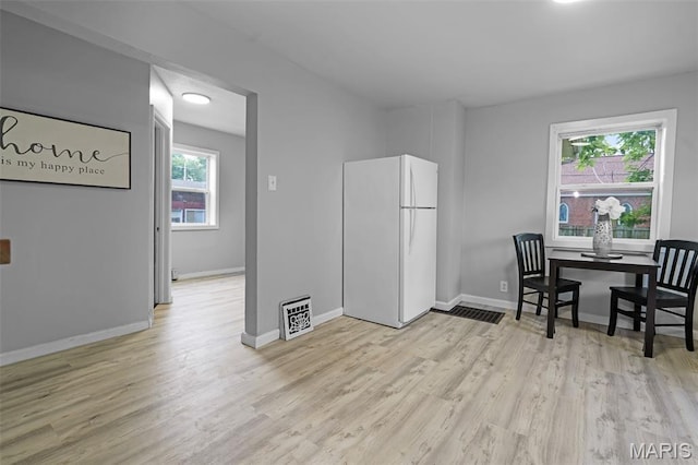 2162 State St, Granite City, IL 62040 - dining room featuring light wood finished floors and baseboards