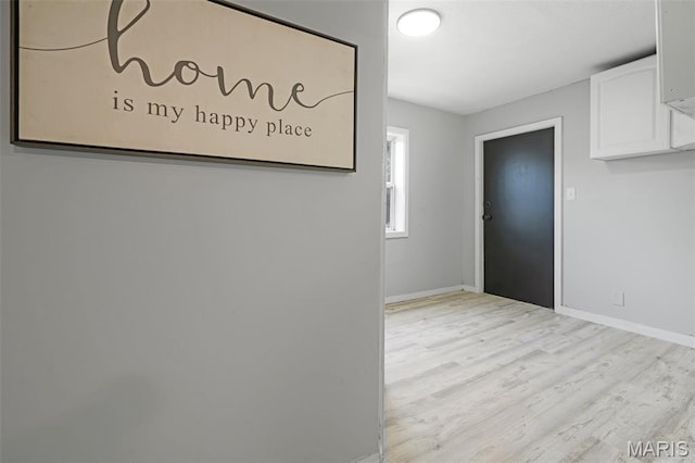 2162 State St, Granite City, IL 62040 - hallway featuring light wood-style flooring and baseboards