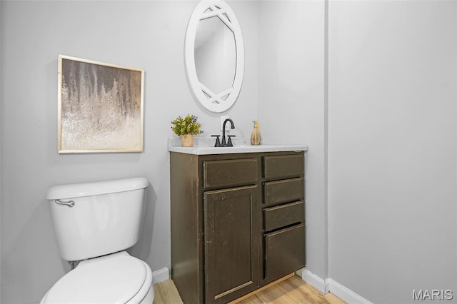 2162 State St, Granite City, IL 62040 - bathroom with vanity and wood finished floors