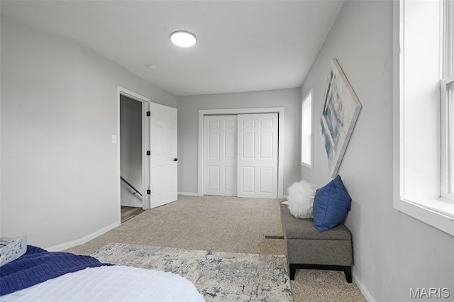 2162 State St, Granite City, IL 62040 - carpeted bedroom with baseboards and a closet