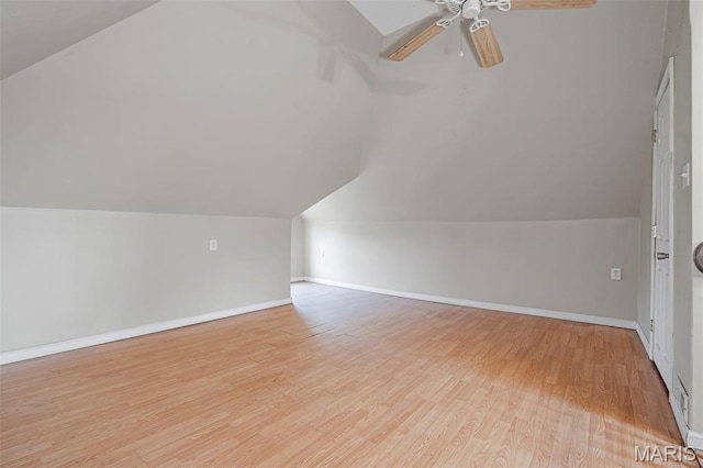 2162 State St, Granite City, IL 62040 - additional living space featuring vaulted ceiling, a ceiling fan, and light wood-style flooring