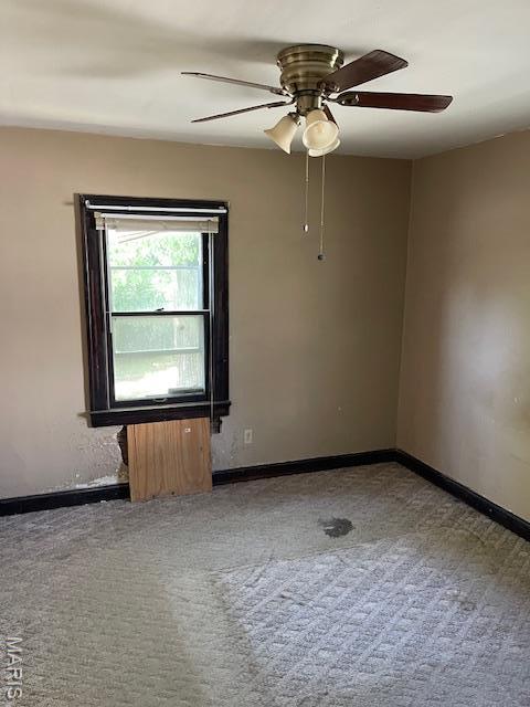 8614 Hume Ave, St John, MO 63114 - carpeted empty room with a ceiling fan and baseboards