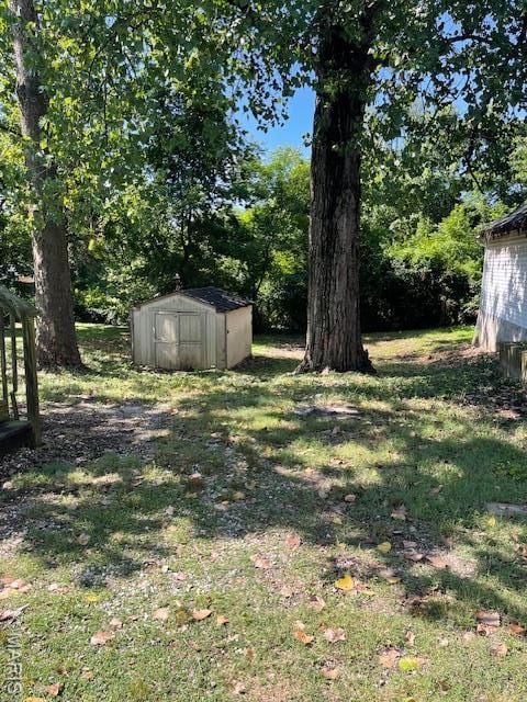 8614 Hume Ave, St John, MO 63114 - view of yard with a storage shed