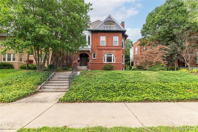 4365 Forest Park Ave, Saint Louis, MO 63108 - view of front of house with brick siding and a chimney