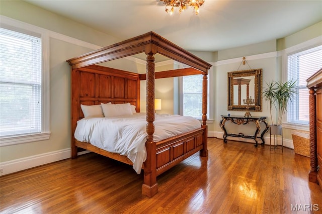 4365 Forest Park Ave, Saint Louis, MO 63108 - bedroom with wood finished floors and baseboards