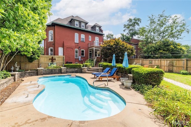 4365 Forest Park Ave, Saint Louis, MO 63108 - view of pool with a fenced backyard and a patio