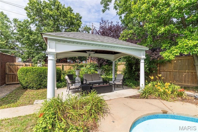 4365 Forest Park Ave, Saint Louis, MO 63108 - view of swimming pool with a gazebo, a fenced backyard, outdoor lounge area, and a patio area