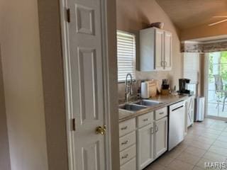 14 Shaderest Ct, Glen Carbon, IL 62034 - kitchen featuring dishwasher, white cabinets, light countertops, light tile patterned floors, and lofted ceiling