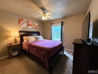 14 Shaderest Ct, Glen Carbon, IL 62034 - carpeted bedroom with a textured ceiling and ceiling fan