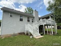 14 Shaderest Ct, Glen Carbon, IL 62034 - back of property featuring a lawn, a chimney, a deck, and stairs